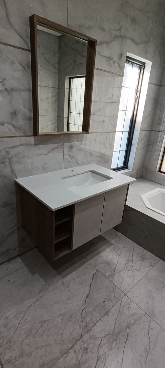 Floor-to-ceiling linen cupboard