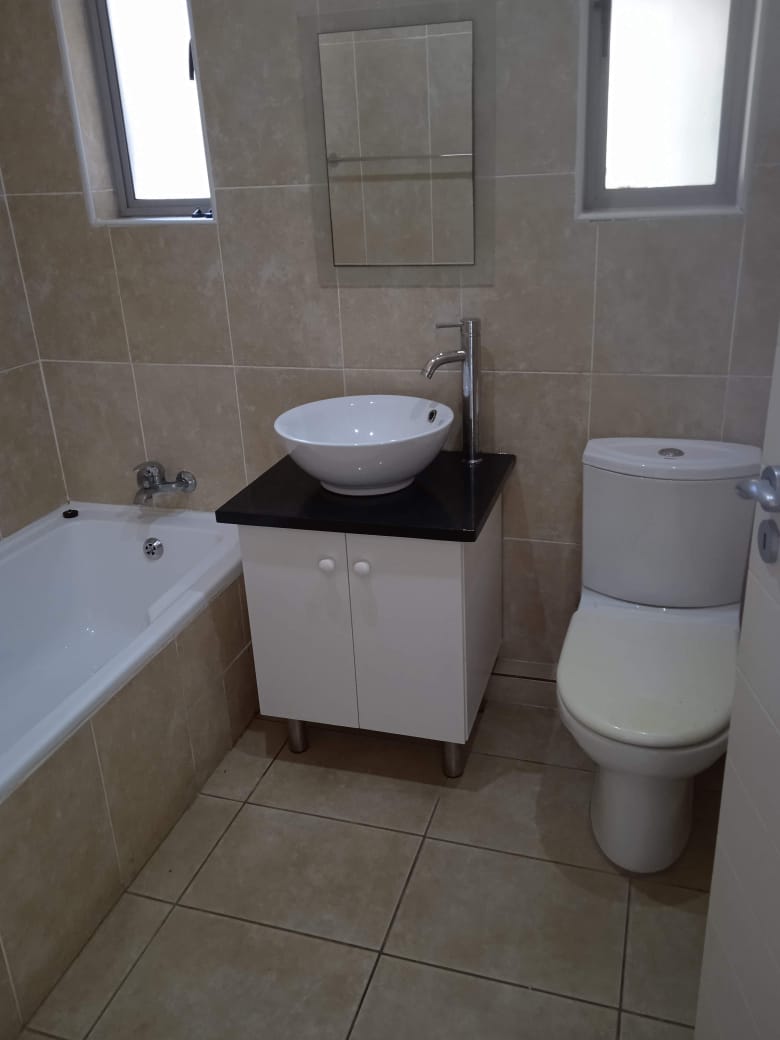 Contemporary bathroom with mirror cabinet