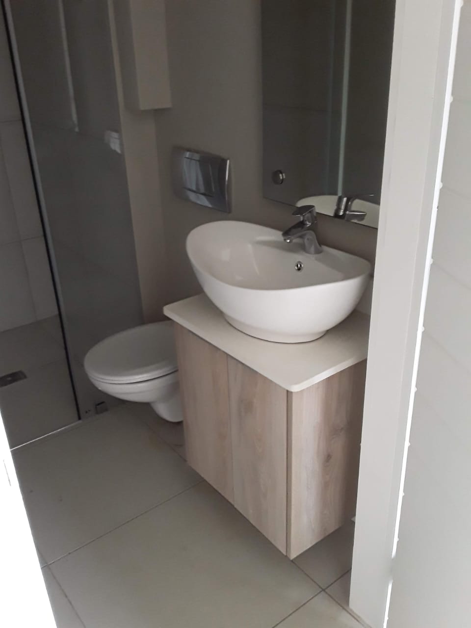 Modern floating bathroom vanity with integrated basin