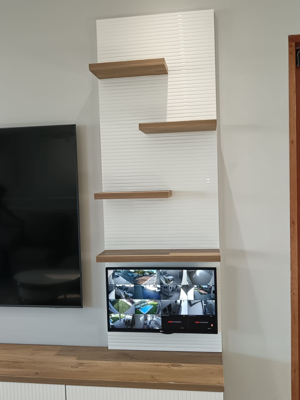 Floating TV cabinet with media storage