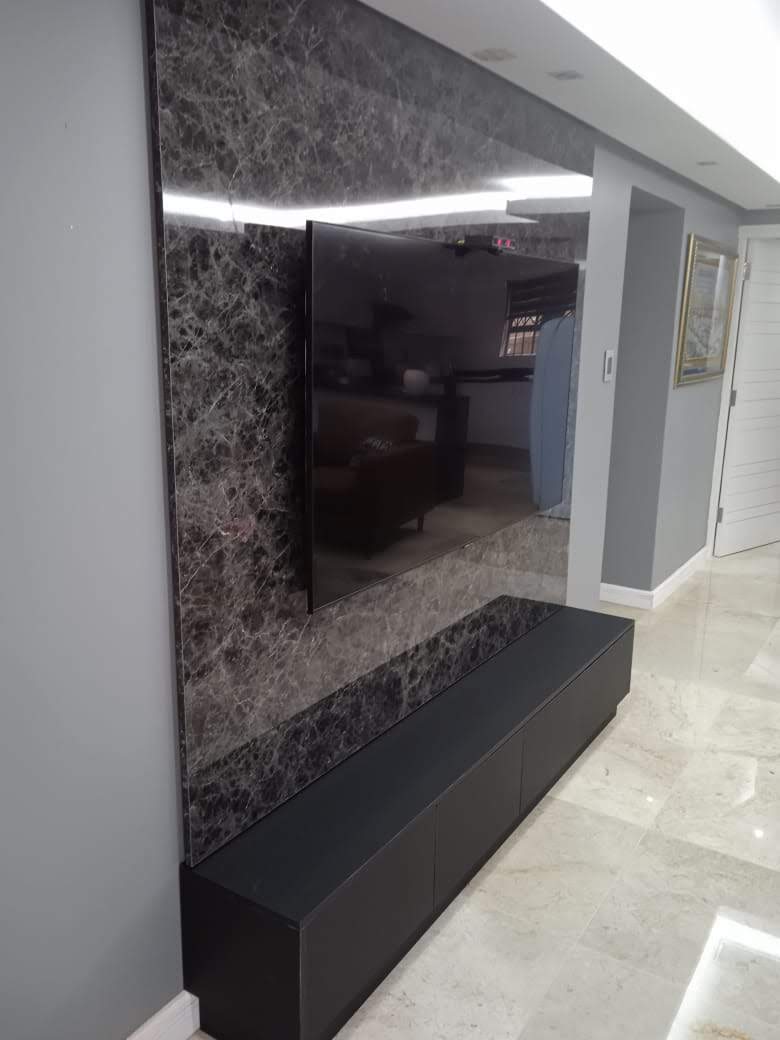 Contemporary TV wall with glass cabinets